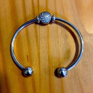 Genuine pandora bangle and charm.